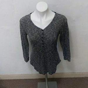 Black and silver knit sweater with open back